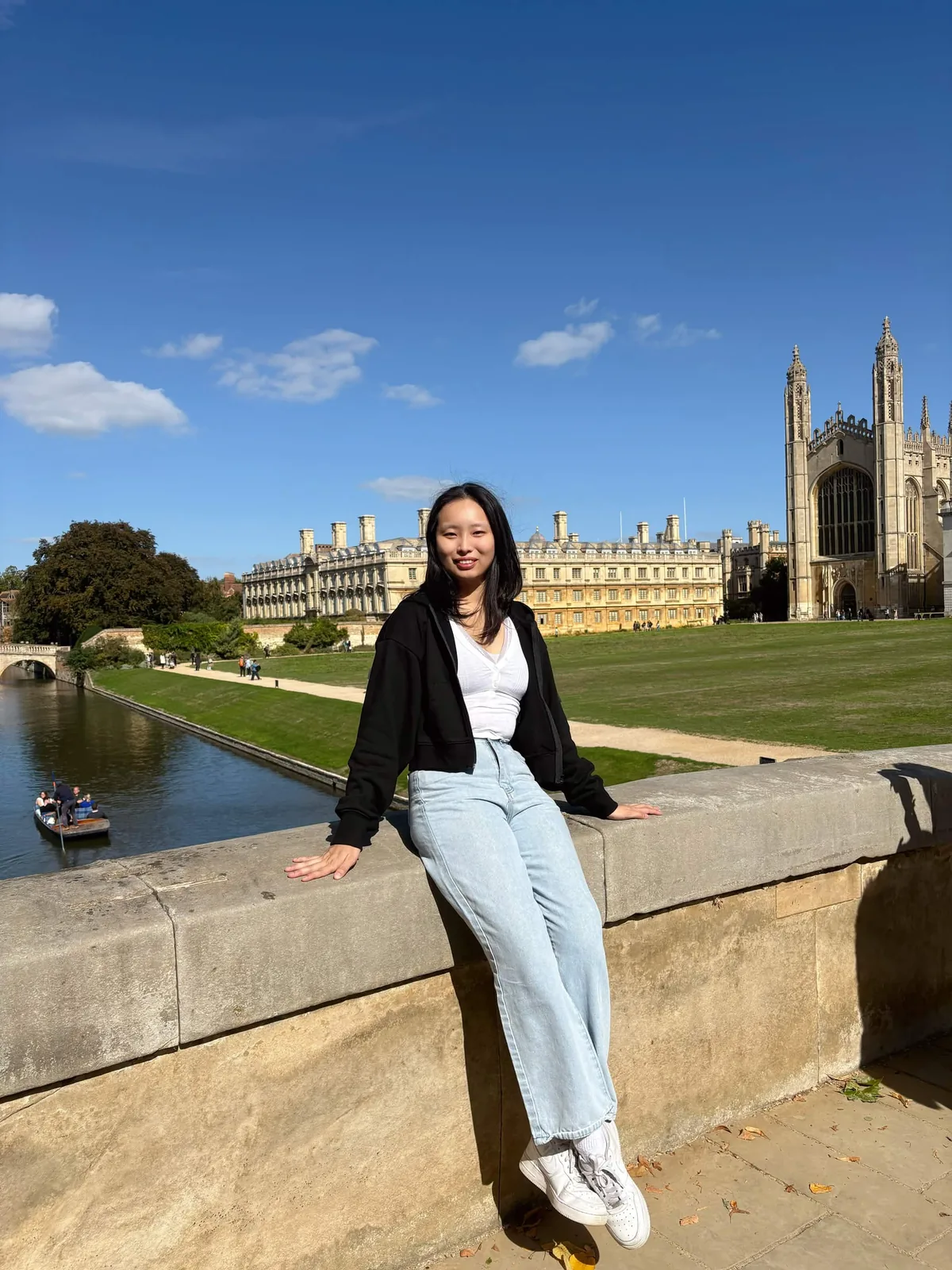 Yifan Wang on a bridge over the River Cam, with King's College Chapel in the background